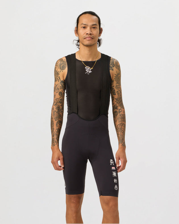 atq-deus-rose-bib-short-black|Model