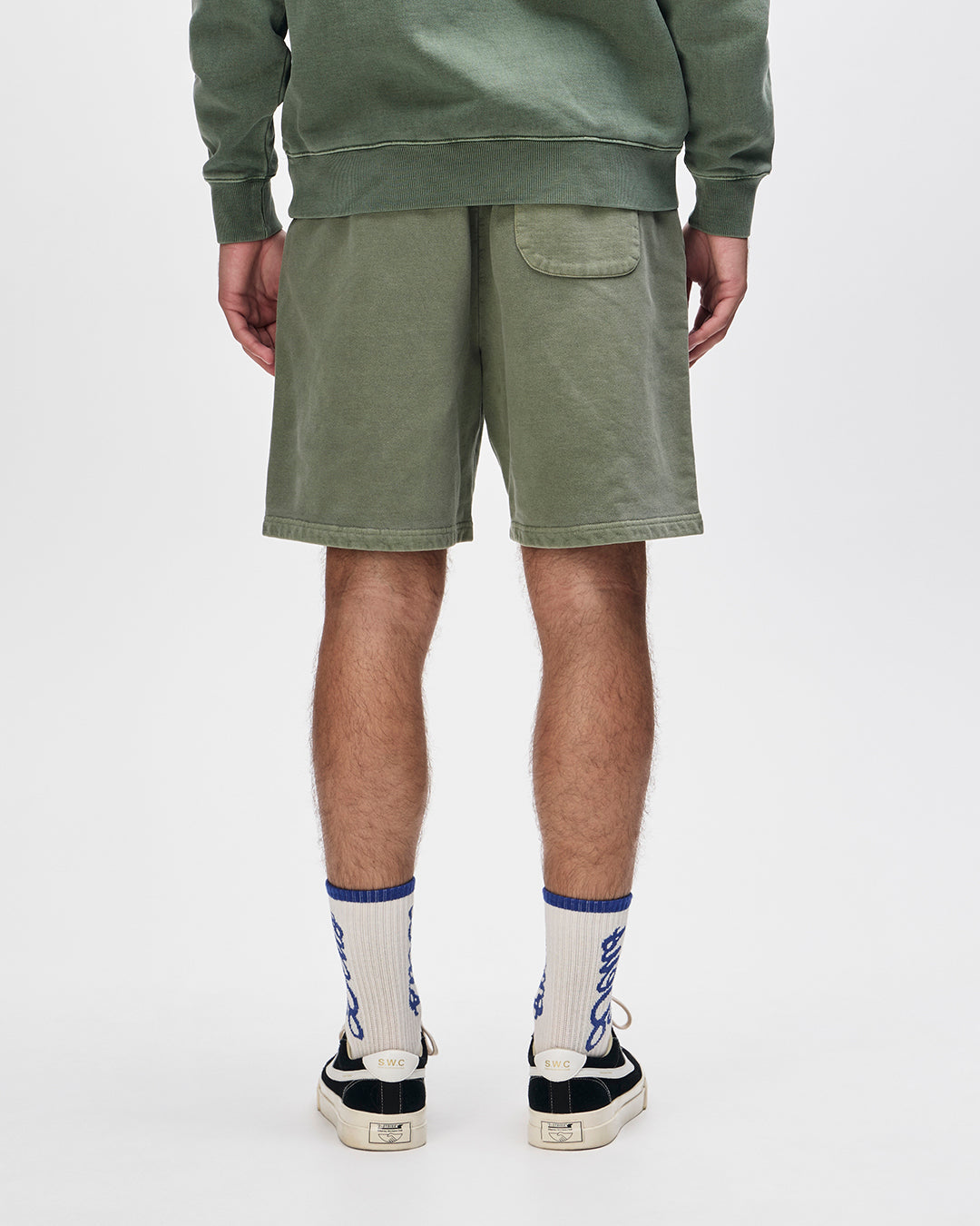 shield-garment-dyed-track-short-cypress-green|Model