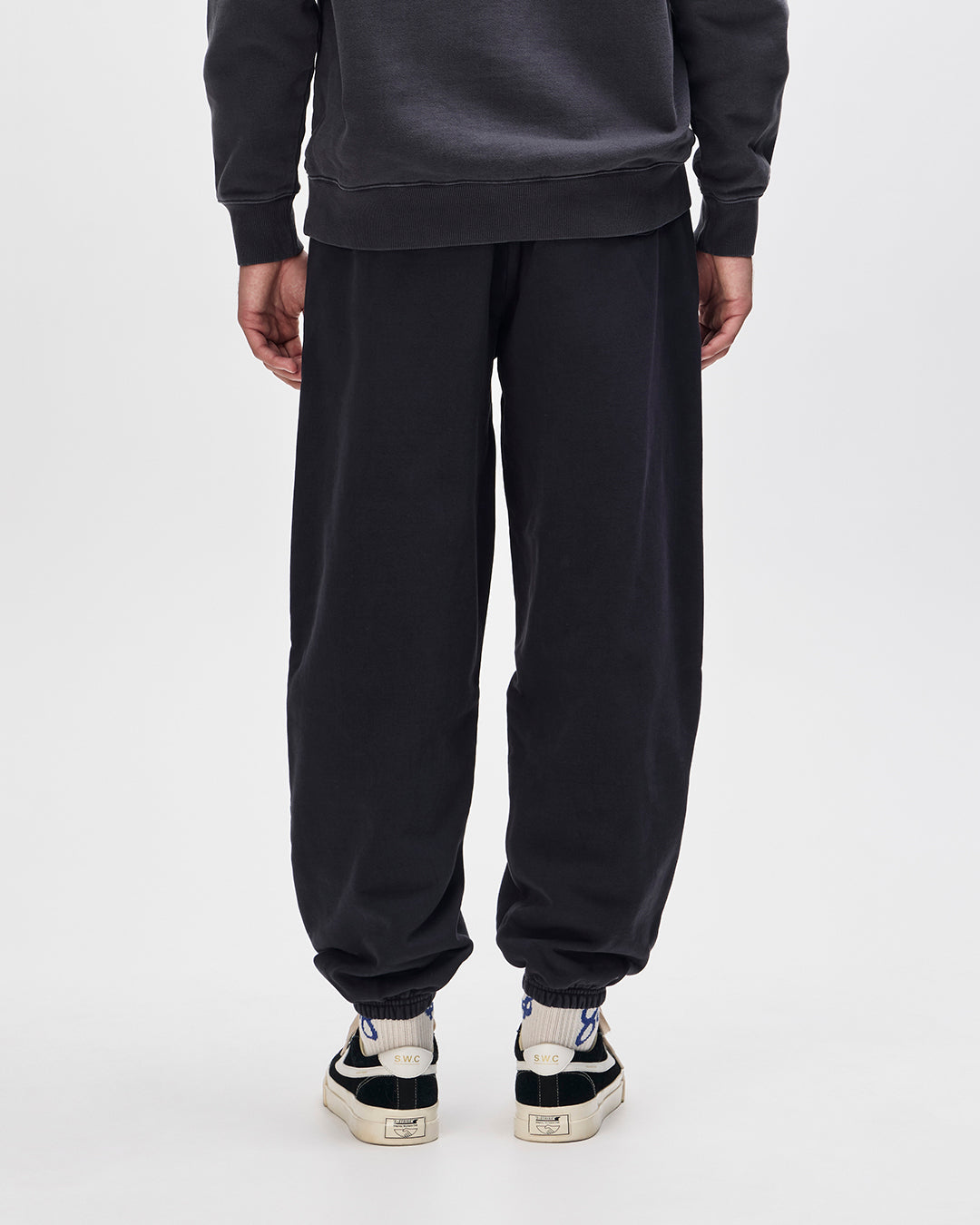 shield-garment-dyed-track-pant-black|Model