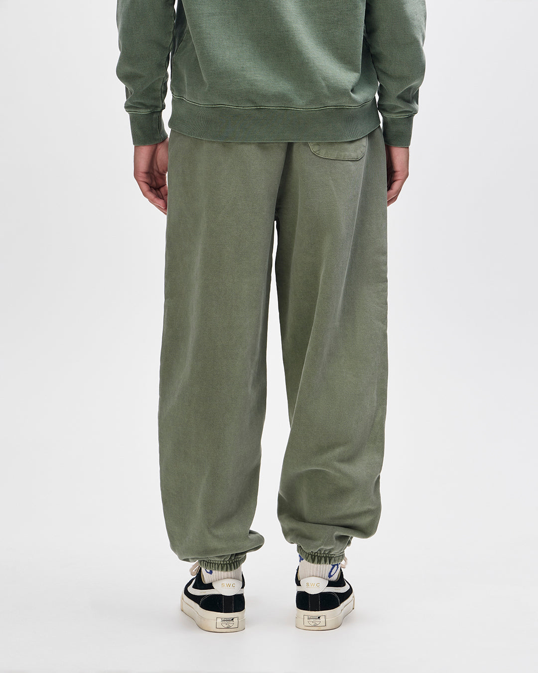 shield-garment-dyed-track-pant-cypress-green|Model