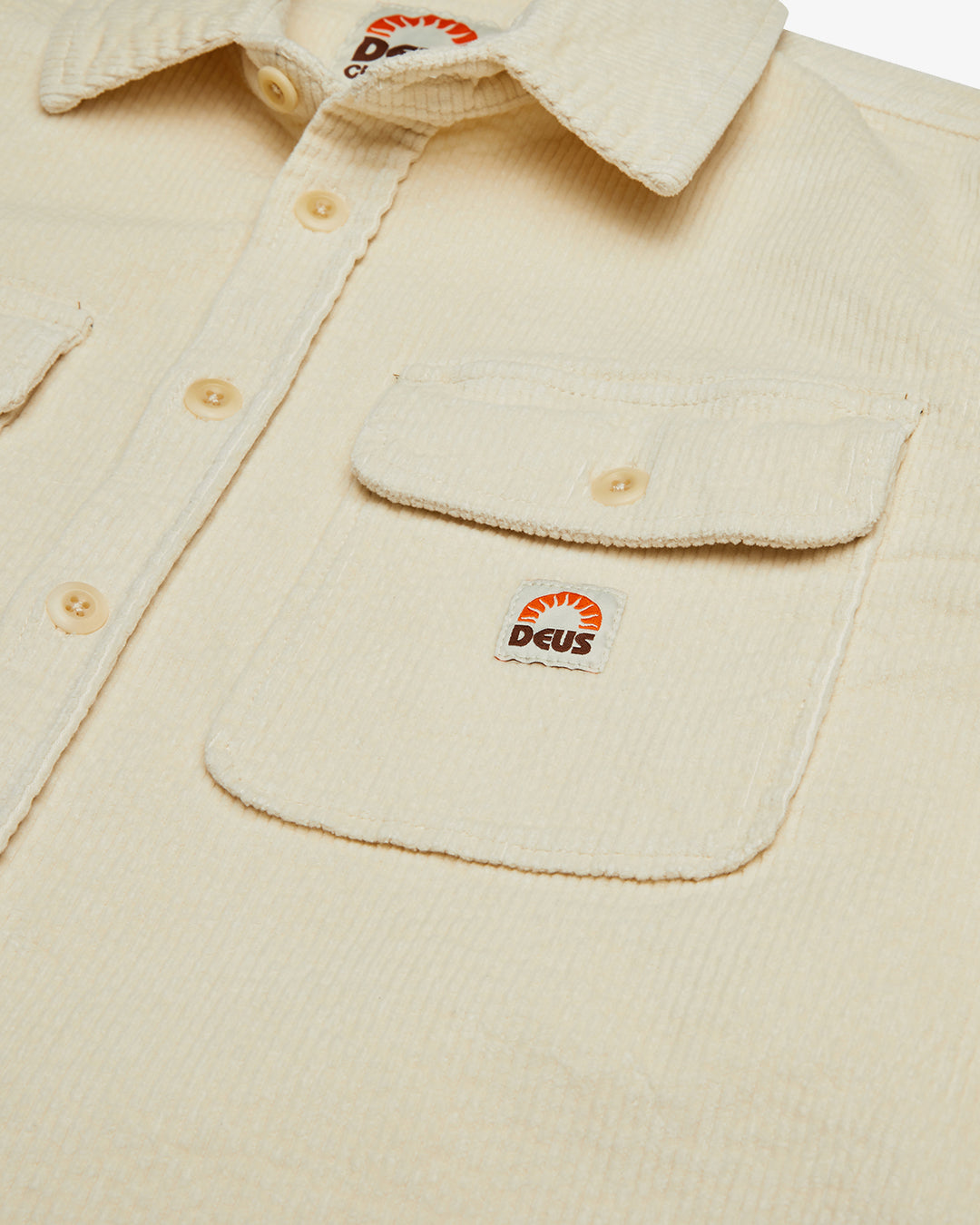 white regular long sleeve shirt with double chest pockets, woven branded label, 98% cotton 2% elastane fabrication with a heavy enzyme stone wash