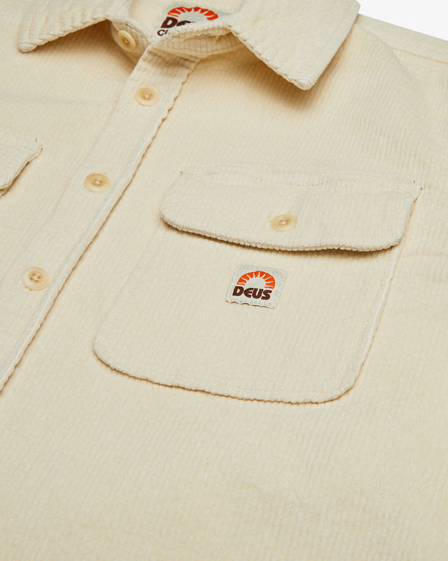 white regular long sleeve shirt with double chest pockets, woven branded label, 98% cotton 2% elastane fabrication with a heavy enzyme stone wash